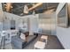 Contemporary living room features a sleek sofa, white tables, and a modern kitchenette at 3726 Las Vegas Blvd # 2605, Las Vegas, NV 89158