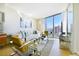 Stylish living room features comfortable seating, modern decor, and a panoramic city view at 3726 Las Vegas Blvd # 2605, Las Vegas, NV 89158