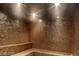 Relaxing steam room with tiled walls, recessed lighting, and a built-in seating area at 3726 Las Vegas Blvd # 2605, Las Vegas, NV 89158
