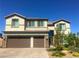 Beautiful two-story home featuring a spacious three-car garage and manicured landscaping at 3921 Jacob Lake Cir, Las Vegas, NV 89118