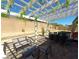 Outdoor dining under a pergola-covered patio at 3921 Jacob Lake Cir, Las Vegas, NV 89118