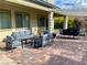 Large outdoor patio with seating and covered lounge area, perfect for relaxing and entertaining at 3921 Jacob Lake Cir, Las Vegas, NV 89118