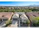 A high angle view of the home showcasing the roof and landscaping in a residential neighborhood at 4137 Cackling Goose Dr, North Las Vegas, NV 89084
