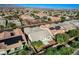 A high angle view of the backyard, fence, landscaping and neighborhood at 4137 Cackling Goose Dr, North Las Vegas, NV 89084