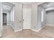 Inviting entryway features neutral color palette, tile flooring, and natural light from the adjacent rooms at 4137 Cackling Goose Dr, North Las Vegas, NV 89084