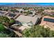 The home features manicured landscaping, a neutral color scheme, and an attractive exterior design at 4137 Cackling Goose Dr, North Las Vegas, NV 89084