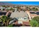 The home features manicured landscaping, a neutral color scheme, and an attractive exterior design at 4137 Cackling Goose Dr, North Las Vegas, NV 89084