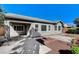 Charming single-story home with well-maintained landscaping and a spacious driveway at 4137 Cackling Goose Dr, North Las Vegas, NV 89084