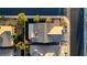 An aerial view of the home's backyard with desert landscaping, privacy fence and a covered patio at 437 Via Stretto Ave, Henderson, NV 89011