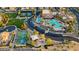 This aerial view showcases community amenities, including a pool, basketball court, and playground at 437 Via Stretto Ave, Henderson, NV 89011