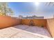 Clean backyard patio featuring a beautiful fountain and brick-style flooring at 437 Via Stretto Ave, Henderson, NV 89011