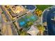 Aerial view of a community basketball court and parking area surrounded by landscaping at 437 Via Stretto Ave, Henderson, NV 89011