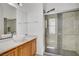 Bright bathroom with a vessel sink, and a glass-enclosed shower for a spa-like experience at 437 Via Stretto Ave, Henderson, NV 89011