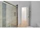 This renovated bathroom boasts modern tile, glass shower, and updated fixtures at 437 Via Stretto Ave, Henderson, NV 89011