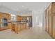 Spacious open kitchen featuring custom cabinetry, stainless steel appliances, and tile flooring at 437 Via Stretto Ave, Henderson, NV 89011