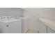 Well-equipped laundry area with modern appliances and efficient storage solutions at 437 Via Stretto Ave, Henderson, NV 89011