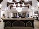 Bright and inviting lobby area featuring a modern reception desk and comfortable seating at 437 Via Stretto Ave, Henderson, NV 89011