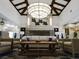 Comfortable seating in a well-lit lobby featuring a decorative fireplace and ornate architectural details at 437 Via Stretto Ave, Henderson, NV 89011