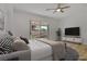 Professionally virtually staged bedroom featuring decor and slider to patio at 437 Via Stretto Ave, Henderson, NV 89011