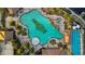 Aerial view of community pools including a lagoon-style pool and a rectangular lap pool at 437 Via Stretto Ave, Henderson, NV 89011