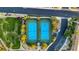 Aerial view showcases the community's well-maintained tennis courts and landscaped surroundings at 437 Via Stretto Ave, Henderson, NV 89011
