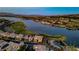 Breathtaking aerial view of a lakeside community showcasing beautiful homes and stunning natural landscapes at 47 Garibaldi Way, Henderson, NV 89011