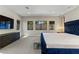 Spacious bedroom with natural light from multiple windows and a sleek, minimalist design at 47 Garibaldi Way, Henderson, NV 89011