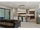 Contemporary dining area adjacent to a gourmet kitchen with ample seating at 47 Garibaldi Way, Henderson, NV 89011