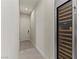 Hallway including wine fridge in neutral color palette at 47 Garibaldi Way, Henderson, NV 89011