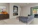 Bright living room featuring a sleek fireplace and sophisticated design at 47 Garibaldi Way, Henderson, NV 89011