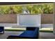 Relaxing patio with view of water feature and outdoor setting at 47 Garibaldi Way, Henderson, NV 89011