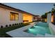 Beautiful backyard showcasing a sparkling pool, manicured lawn, and a tranquil outdoor oasis at 47 Garibaldi Way, Henderson, NV 89011