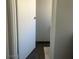 A glimpse into the bathroom reveals a clean, minimalist design and tile flooring at 4704 Obannon Dr # D, Las Vegas, NV 89102