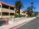 Charming condo complex with mature landscaping and well-maintained exterior features on a sunny day at 4704 Obannon Dr # D, Las Vegas, NV 89102