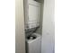 This laundry area features a stacked washer and dryer unit for space-saving convenience at 4704 Obannon Dr # D, Las Vegas, NV 89102