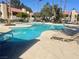 Inviting community pool with ample lounge chairs and a relaxing atmosphere at 4704 Obannon Dr # D, Las Vegas, NV 89102