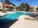 Inviting community pool with ample lounge chairs and a relaxing atmosphere at 4704 Obannon Dr # D, Las Vegas, NV 89102