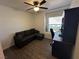 Bedroom showcasing a bed, a ceiling fan, and a desk at 511 Credence Ave, Henderson, NV 89002