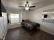 This bedroom features a ceiling fan and a window with a ledge for decor at 511 Credence Ave, Henderson, NV 89002