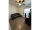 Bedroom showcasing a bed, a ceiling fan, and a desk at 511 Credence Ave, Henderson, NV 89002