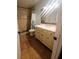 Bathroom featuring tiled shower with built-in bench and vanity at 5312 Manuel Dr, Las Vegas, NV 89149