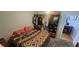 Bedroom features an open closet and views to another living area at 5312 Manuel Dr, Las Vegas, NV 89149