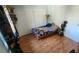 Cozy bedroom featuring laminate wood flooring and a bright window at 5312 Manuel Dr, Las Vegas, NV 89149