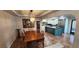Open-concept kitchen and dining area with stainless steel appliances and an island with a sink at 5312 Manuel Dr, Las Vegas, NV 89149