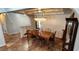 Bright dining area featuring a wooden table, chandelier, and tile flooring at 5312 Manuel Dr, Las Vegas, NV 89149