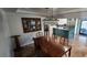 Beautiful dining room next to kitchen with stylish chandelier and view of kitchen island at 5312 Manuel Dr, Las Vegas, NV 89149