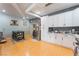 Bright kitchen with white cabinets, stainless steel appliances, and a cozy breakfast nook at 5312 Manuel Dr, Las Vegas, NV 89149