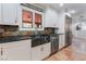 Kitchen featuring stainless steel appliances, stone countertops, and custom cabinets at 5312 Manuel Dr, Las Vegas, NV 89149