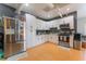 Contemporary kitchen with stainless steel appliances, white cabinetry, and hardwood floors at 5312 Manuel Dr, Las Vegas, NV 89149