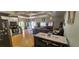 Open concept living room and kitchen with appliances and seating at 5312 Manuel Dr, Las Vegas, NV 89149
